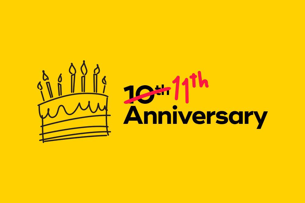 Yellow background featuring a hand-drawn cake with ten candles. The text says '10th Anniversary,' with '10th' crossed out and replaced by '11th' in red.