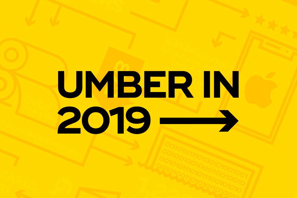Yellow background with black text 'UMBER IN 2019' and an arrow pointing right. Faint imagery includes a mobile phone and arrows, creating a tech-themed design.