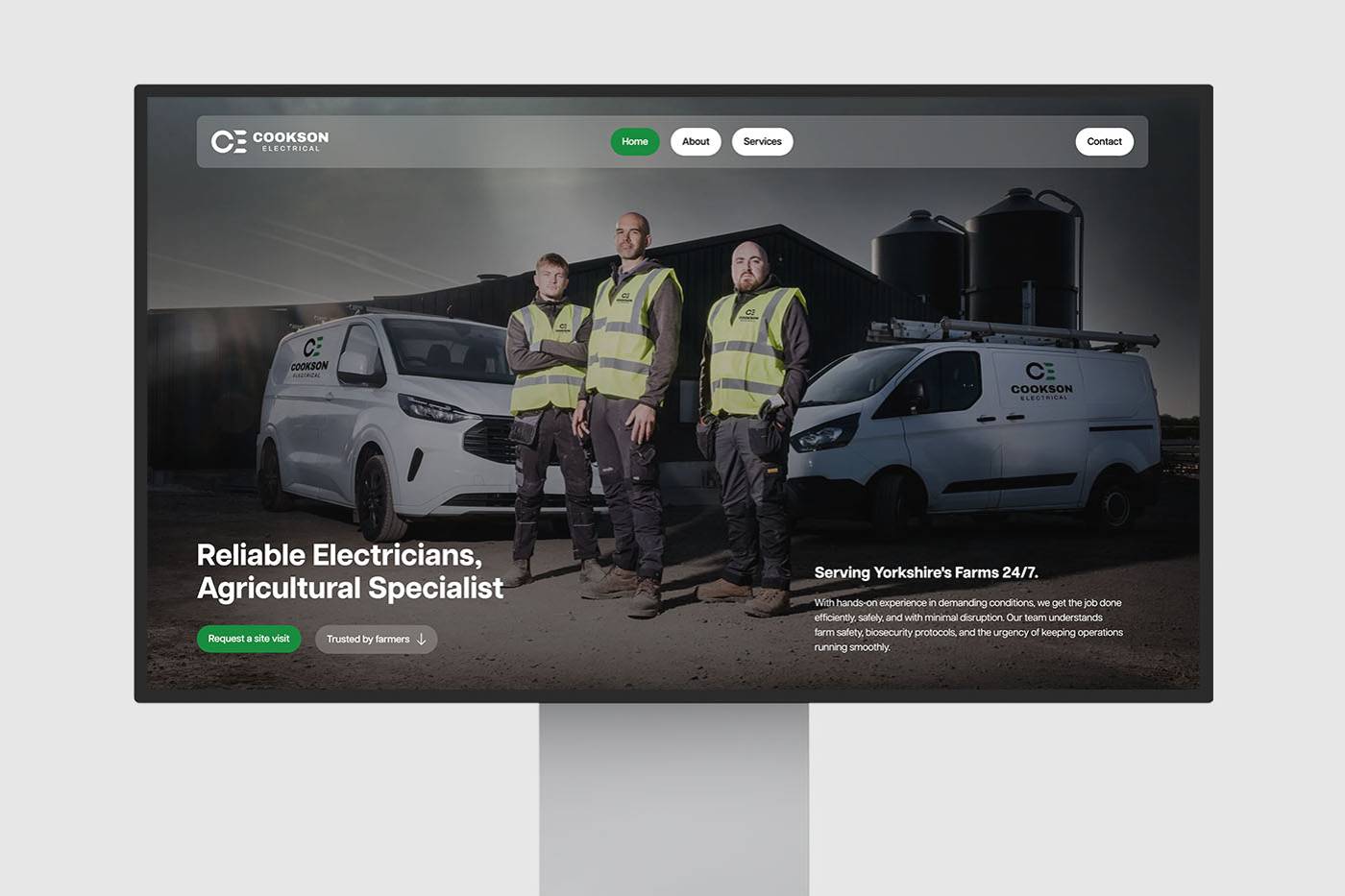 Four electricians in high-visibility vests stand confidently in front of two branded vans. Text: 'Reliable Electricians, Agricultural Specialist.'